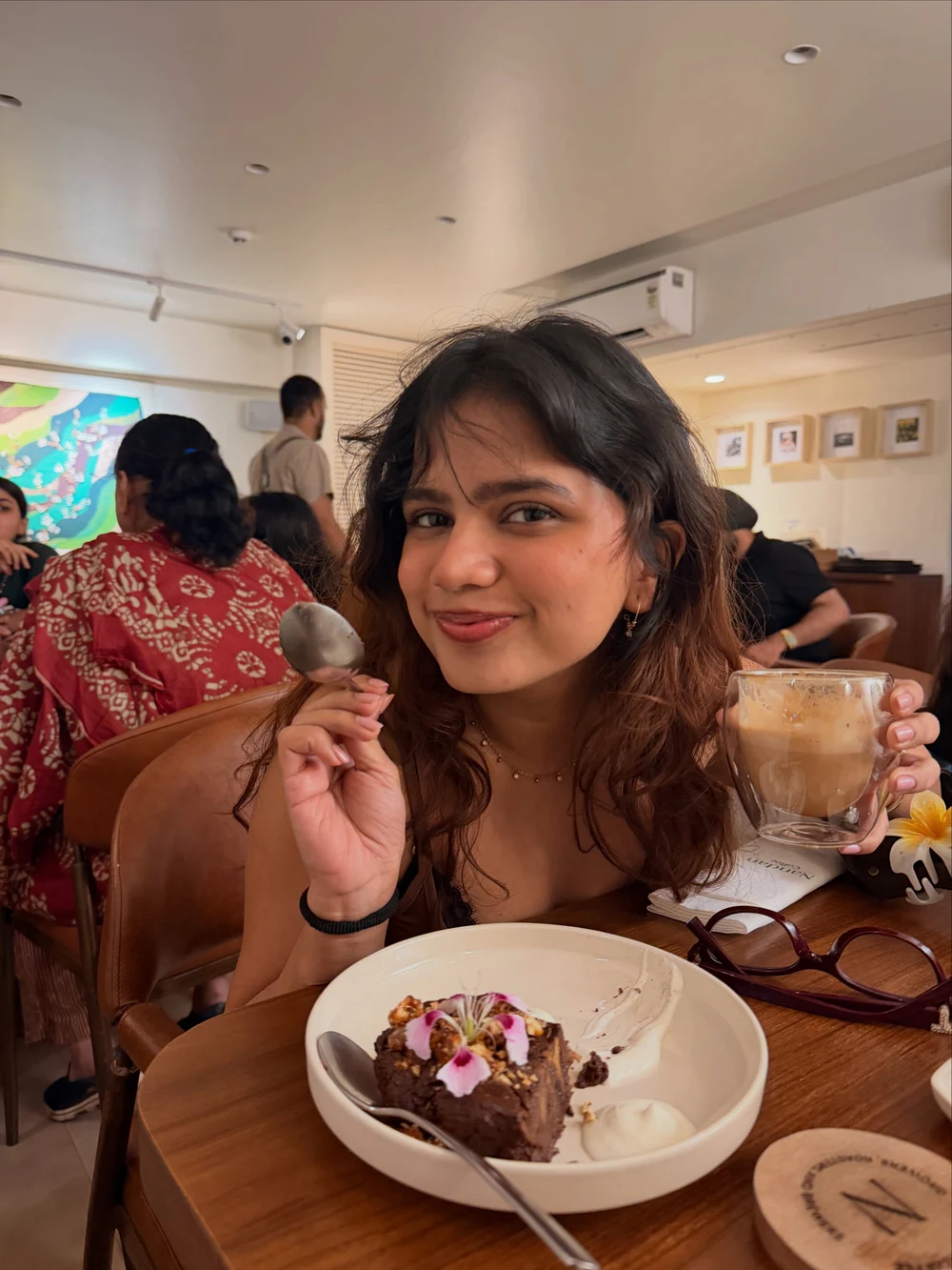Srishti taking a break at a café